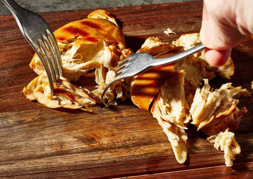 Cultivated meat made with serum-free cell growth media