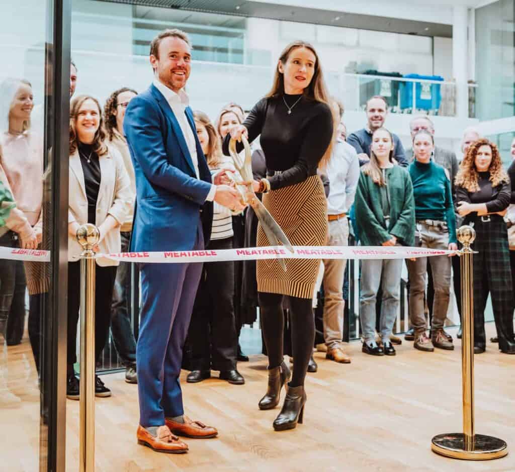 Meatable's CEO Krijn de Nood cutting the ribbon of the company's new pilot facility