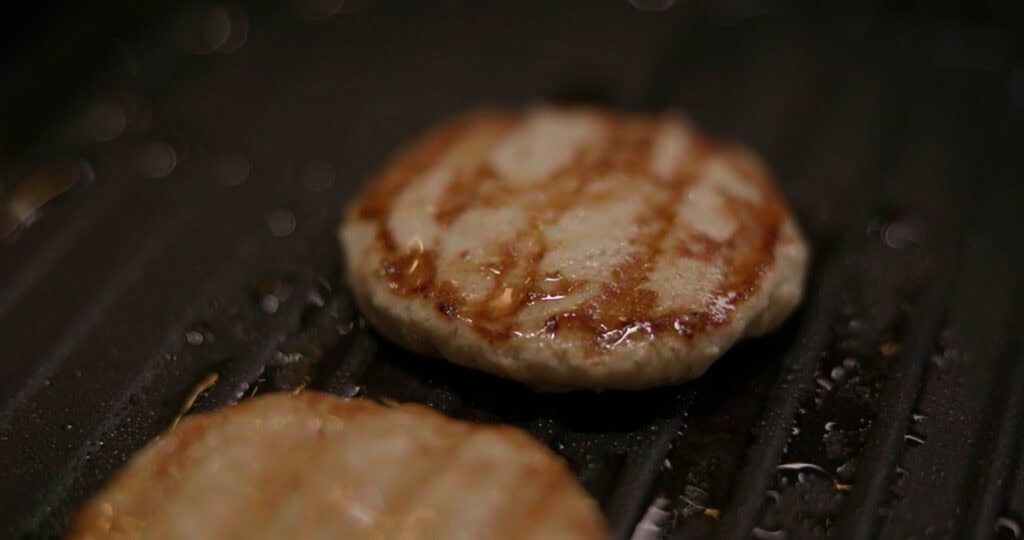 SuperMeat's cultivated burgers, grilled